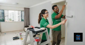 A Fast Repair SG image featuring a male and a female painter painting a wall.